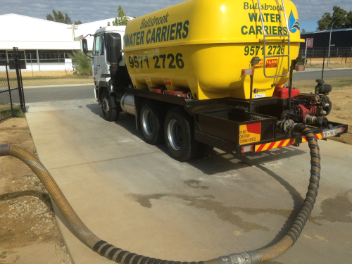 Water truck being filled up